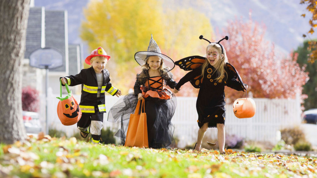 Children in Halloween costumes are on their way to a fall fundraising event.